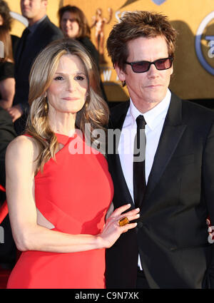 KYRA SEDGWICK & KEVIN BACON 18TH ANNUAL SCREEN ACTORS GUILD AWARDS. ARRIVALS DOWNTOWN LOS ANGELES CALIFORNIA USA 29 January 2 Stock Photo