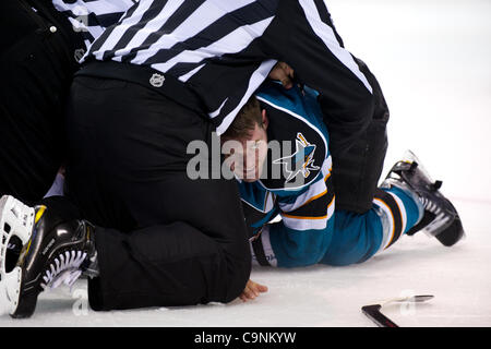 Jan. 31, 2012 - San Jose, California, U.S - Sharks defenseman Colin White (5) smiles as he is restrained by an official during the NHL game between the San Jose Sharks and the Columbus Blue Jackets at HP Pavilion in San Jose, CA.   The Sharks won 6-0. (Credit Image: © Matt Cohen/Southcreek/ZUMAPRESS Stock Photo