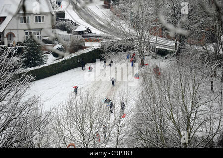 Crowds out enjoying the snow in Lewes East Sussex this morning after the overnight snowfall UK Stock Photo