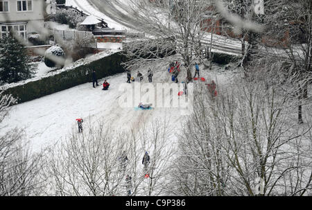 Crowds out enjoying the snow in Lewes East Sussex this morning after the overnight snowfall UK Stock Photo
