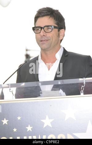 John Stamos at the induction ceremony for Star on the Hollywood Walk of Fame Ceremony for AMERICA, Hollywood Boulevard, Los Angeles, CA February 6, 2012. Photo By: Michael Germana/Everett Collection Stock Photo