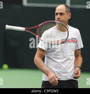Italy's Davis Cup Captain Corrado Barazzutti juggles his rocket during a training session in the CEZ Arena in Ostrava, Czech Republic, Wednesday, Feb. 8, 2012. Italy faces the Czech Republic in the World Group first round. (CTK Photo/Jaroslav Ozana) Stock Photo