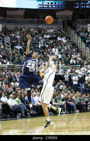 Michigan State's Travis Trice (20) dunks on a fast break over Purdue's ...