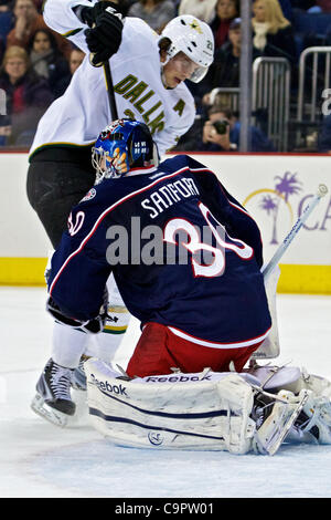 Feb. 9, 2012 - Columbus, Ohio, U.S - Dallas Stars left wing Loui Eriksson (21) tries to get the puck around Columbus Blue Jackets goalie Curtis Sanford (30) in the first period of the game between the Dallas Stars and Columbus Blue Jackets at Nationwide Arena, Columbus, Ohio. (Credit Image: © Scott  Stock Photo