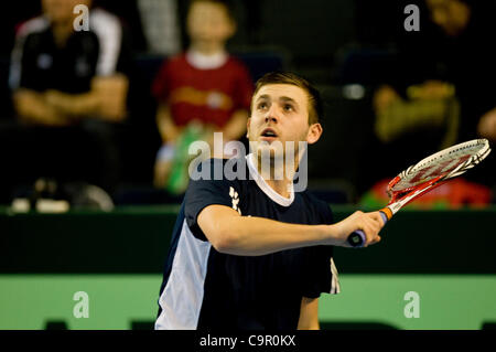 Dan Evans and Lucas Lacko contest the first match in the Davis cup by BNP Paribas, Great Britain v Slovak Republic tie at Glasgows' Braehead Arena. Stock Photo