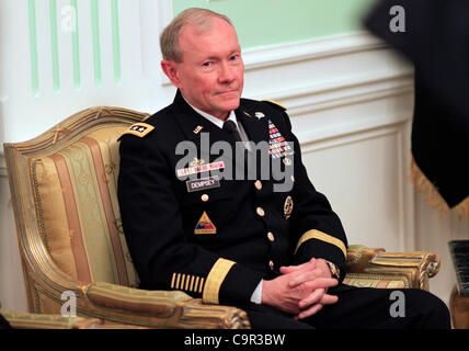 U.S. Chairman of the Joint Chiefs of Staff, Gen. Martin Dempsey, meets with Field Marshal Mohamed Hussein Tantawi, unseen, head of Egypt's ruling military council, at the Ministry of Defense in Cairo, Egypt, Saturday, Feb. 11, 2012. (AP Photo/Khalil Hamra, Pool) Stock Photo