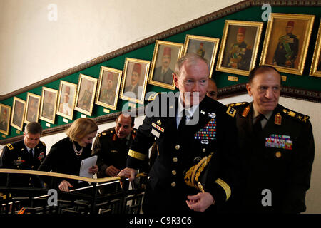 U.S. Chairman of the Joint Chiefs of Staff, Gen. Martin Dempsey, left, walks next to Lt. Gen. Sami Anan, right, upon his arrival to meet with Field Marshal Mohamed Hussein Tantawi, head of Egypt's ruling military council, at the Ministry of Defense in Cairo, Egypt, Saturday, Feb. 11, 2012. (AP Photo Stock Photo