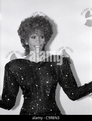 Whitney Houston poses for a picture during an award show file photo. Singer and actress Whitney Houston, winner of six Grammy Awards including record of the year for 'I Will Always Love You' and album of the year for 'The Bodyguard,' has died at age 48, a spokeswoman for the singer said on February  Stock Photo