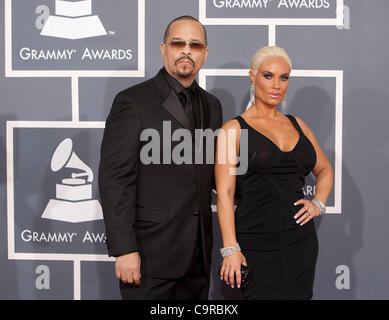 Rapper Ice-T (L) and wife Nicole Austin (aka Coco) on the red carpet of the 54th Annual Grammy Awards at the Staples Center in Los Angeles, California on Sunday, February 12, 2012. ADRIAN SANCHEZ-GONZALEZ/PI Stock Photo