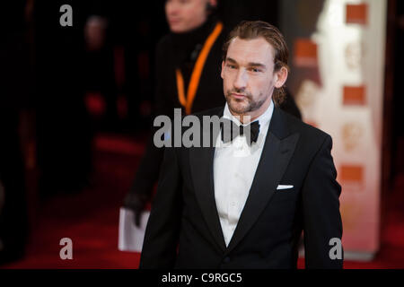 London, UK, 12/02/2012. Actor, Joseph Mawie arriving at the 2012 BAFTAs Stock Photo