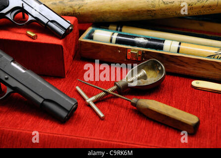 Feb. 13, 2012 - Las Vegas, Nevada, USA -  Weapons associated with organized crime are displayed at The Mob Museum February 13, 2012 in Las Vegas, Nevada. The museum, also known as the National Museum of Organized Crime and Law Enforcement, opens on February 14 and chronicles the history of organized Stock Photo