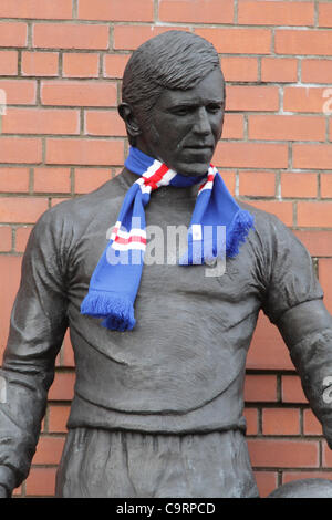 Ibrox Stadium, Edmiston Drive, Ibrox, Glasgow, Scotland, UK, Tuesday, 14th February, 2012. Statue of ex-player and manager John Greig, wearing a Rangers scarf, part of the memorial to the disasters and tragedies at Ibrox Stadium, the home of Glasgow Rangers Football Club Stock Photo