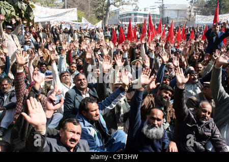 Members of WAPDA Hydro Electric Central Labor Union chant slogans in favor of their demands during a protest demonstration at Lahore press club on  Thursday, February 16, 2012. Stock Photo