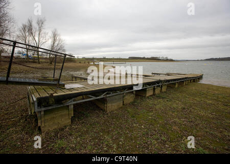 Water levels are low at Rutland Water near Oakham,Rutland,England. The reservoir one of the largest artificial lakes in Europe and supplies reserve drinking water in the driest and most densely populated quarter of the United Kingdom.The East Midland and East Anglia are facing restriction on water u Stock Photo