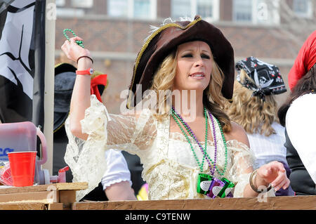 Feb. 18, 2012 - Saint Louis, Missouri, U.S - A parade float rider dressed as a pirate throws beads to the crowd watching the parade during the 2012 Mardi Gras parade and festival at the Soulard District in St. Louis, MO. (Credit Image: © Richard Ulreich/Southcreek/ZUMApress.com) Stock Photo