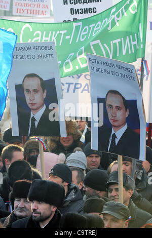 February 18,2012. St.Petersburg,Russia. Thousands of people across Russia rallied Saturday behind Prime Minister Valdimir Putin in his bid to become president.Pictured: people with portraits of Vladimir Putin. Stock Photo