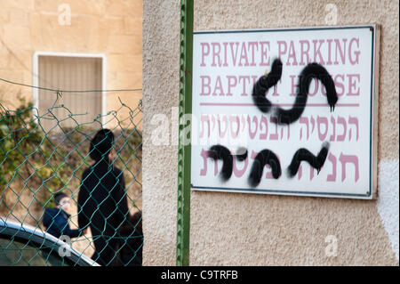 JERUSALEM - FEBRUARY 20: Anti-Christian graffiti was found on the walls ...