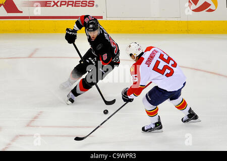 Feb. 25, 2012 - Raleigh, North Carolina, U.S - Carolina Hurricanes left wing Jussi Jokinen (36) and Florida Panthers defenseman Ed Jovanovski (55) during tonights game.Panthers defeated Hurricanes  3-2 at RBC Center in Raleigh North Carolina. (Credit Image: © Anthony Barham/Southcreek/ZUMAPRESS.com) Stock Photo