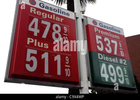 Feb. 27, 2012 - Los Angeles, California, U.S. - Gas prices clustered at the $5 mark are posted at a gas station on Feb. 27, 2012 in Los Angeles. The average price of a gallon of self-serve regular gasoline climbed in Los Angeles County today for the 21st straight day, rising to its highest price sin Stock Photo