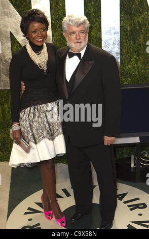 Feb. 26, 2012 - Hollywood, California, U.S - Director George Lucas and wife Mellody Hobson on the red carpet at the Vanity Fair Oscar party at the Sunset Towers in West Hollywood, California (Credit Image: © Susan J. Rose/Prensa Internacional/ZUMAPRESS.com) Stock Photo