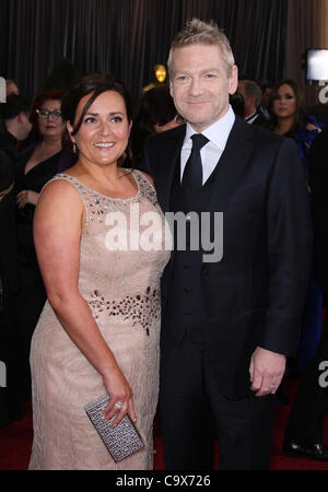 LINDSAY BRUNNOCK & KENNETH BRANAGH THE 84TH ACADEMY AWARDS ARRIVALS LOS ANGELES CALIFORNIA USA 26 February 2012 Stock Photo