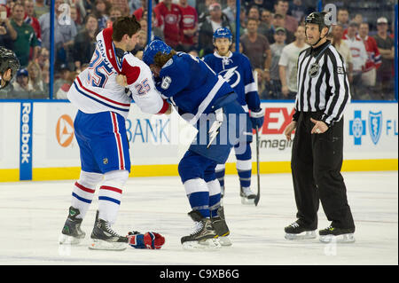 Feb. 28, 2012 - Tampa, Florida, United States of America - Feb. 28, 2012 - Tampa, Florida, United States of America. Tampa Bay Lightning Forward Pierre-Cedric Labrie fights with Montreal Canadiens right wing Brad Staubitz (25) during the third period of play in the game between the Tampa Bay Lightni Stock Photo