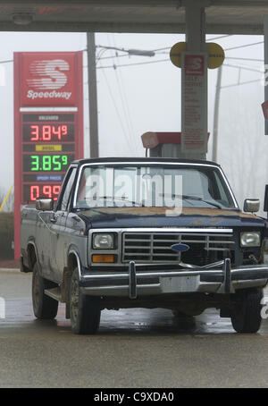 Feb. 29, 2012 - Whitmore Lake, Michigan, U.S - An old Ford truck sits in front of a Speedway sign showing fuel prices in Whitmore Lake, MI on Feb 29, 2012.  Gas prices are on the rise and have become a campaign issue recently. (Credit Image: © Mark Bialek/ZUMAPRESS.com) Stock Photo