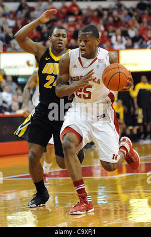 Feb. 29, 2012 - Lincoln, Nebraska, U.S - Nebraska guard Caleb Walker (25) drives past Iowa guard Bryce Cartwright (24). Iowa defeated Nebraska 62-53 in a game played at the Bob Devaney Sports Center in Lincoln, Nebraska. (Credit Image: © Steven Branscombe/Southcreek/ZUMApress.com) Stock Photo