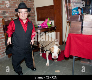 March 2, 2012 - Bethlehem, PA, U.S - Author and reality show star, SHORTY ROSSI, of the hit TV show, ''Pit Boss'' and his work dog and companion, HERCULES, at his book signing and cigar promotion event held at Cigars International in Bethlehem Pa. Rossi the owner and talent manager of, Shortywood Pr Stock Photo