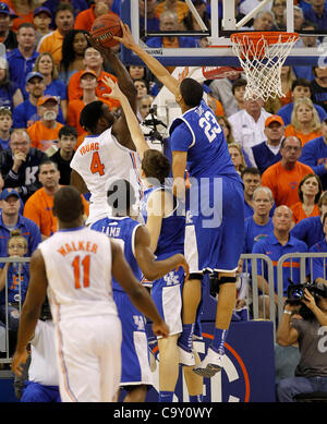 March 4, 2012 - Gainesville, KY, USA - UK's Anthony Davis blocked a shot by Florida's Patric Young as the the University of Kentucky played the University of Florida in the O'Connell Center in Gainesville, Fl.,  Sunday, March 04, 2012. This is first  half men's college basketball action. Charles Ber Stock Photo