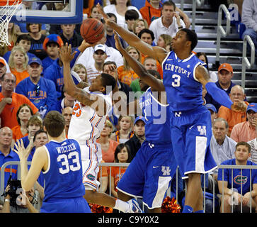 March 4, 2012 - Gainesville, KY, USA - UK's Terrence Jones blocked a shot by Florida's 23- Bradley Beal as the the University of Kentucky played the University of Florida in the O'Connell Center in Gainesville, Fl.,  Sunday, March 04, 2012. This is first  half men's college basketball action. Charle Stock Photo