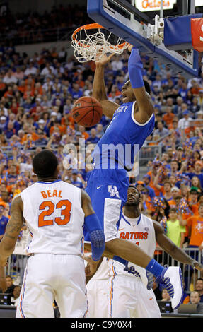 March 4, 2012 - Gainesville, KY, USA - UK's Terrence Jones dunked in front of Florida's  Bradley Beal as the the University of Kentucky played the University of Florida in the O'Connell Center in Gainesville, Fl.,  Sunday, March 04, 2012. This is first  half men's college basketball action. Charles  Stock Photo