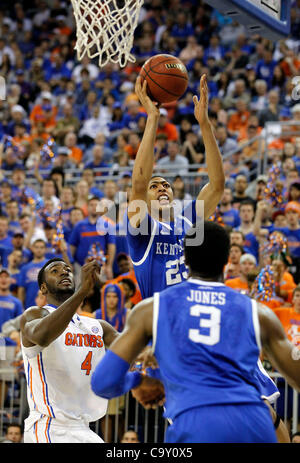 March 4, 2012 - Gainesville, KY, USA - UK's Anthony Davis scoredin front of Florida's Patric Young as Terrence Jones moved in as the the University of Kentucky played the University of Florida in the O'Connell Center in Gainesville, Fl.,  Sunday, March 04, 2012. This is first  half men's college bas Stock Photo