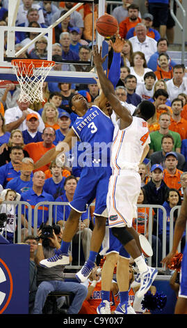 March 4, 2012 - Gainesville, KY, USA - UK's Terrence Jones blocked a shot by Florida's Patric Young as the the University of Kentucky played the University of Florida in the O'Connell Center in Gainesville, Fl.,  Sunday, March 04, 2012. This is first  half men's college basketball action. Charles Be Stock Photo