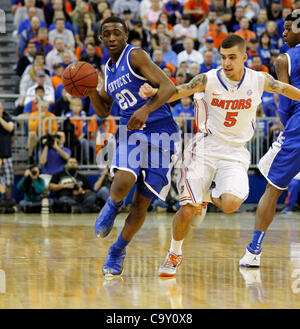 March 4, 2012 - Gainesville, KY, USA - UK's Doron Lamb brought the ball upcourt despite the defensive pressure from Florida's Scotty Wilbekin as the the University of Kentucky played the University of Florida in the O'Connell Center in Gainesville, Fl.,  Sunday, March 04, 2012. This is first  half m Stock Photo