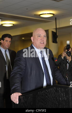 Nassau County Legislature, controlled by Republicans, votes along party lines to consolidate 8 police precincts into 4, on Monday, March 5, 2012, at Mineola, New York, USA. Nassau PBA (Police Benevolent Association) President James Carver (at podium) spoke against closing precincts. Stock Photo