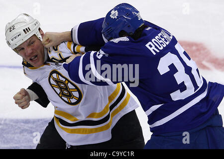 March 6, 2012 - Toronto, Ontario, Canada - Toronto Maple Leaf forward Jay Rosehill (38) and Boston Bruins Shawn Thornton (22) engage in a fight during NHL action at the Air Canada Centre in Toronto, Ontario. Boston defeated Toronto 5-4. (Credit Image: © Jay Gula/Southcreek/ZUMAPRESS.com) Stock Photo