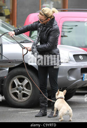 London, UK, 09/03/2012 Girls Aloud singer Sarah Harding seen out with her dogs in Primrose Hill, London Stock Photo