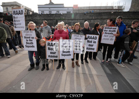 10 March 2012 - Londonderry, Northern Ireland, UK - Protesters attend a rally calling for a republican vigilante group,  Republican Action Against Drugs (RAAD) to disband following punishment shootings in the Bogside on Wednesday, death  threats and the killing of a father of two last month. Stock Photo
