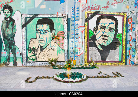 Mohammed Mahmud street also nicknamed in arabic as 'the street of the eyes of the freedom' is a symbol of the struggle of the egyptian people to build a democratic country one year after the revolution. The walls of the street ( which witnessed some of worst battles between the security forces & the Stock Photo