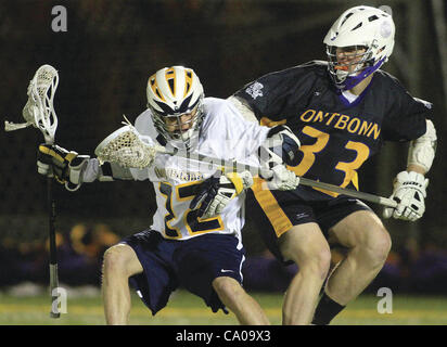 March 10, 2012 - Rock Island, Iowa, U.S. - Augustana's David Gerena is hit by Fontbonne defenseman Samuel Mahoney in the attach area of the field, Friday, March 9, 2012, during first-half action on Thorson-Lucken Field in Rock Island. (Credit Image: © John Schultz/Quad-City Times/ZUMAPRESS.com) Stock Photo