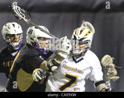 March 10, 2012 - Rock Island, Iowa, U.S. - Augustana's Jesse Nagelberg is hit by Fontbonne's Mike Liebreich as he carries the ball in the attach area of the field, Friday, March 9, 2012, during first-half action on Thorson-Lucken Field in Rock Island. (Credit Image: © John Schultz/Quad-City Times/ZU Stock Photo