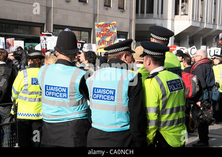 Metropolitan Police and Police Liaison Officers talking before the ...