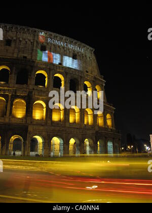 14 Mar, 2012. colosseum in rome italy illuminated as a sign of solidarity for the two Italian army marines soldiers arrested in India for allegedly killing two fishermen. Stock Photo