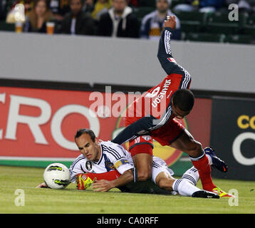 March 14, 2012 - Los Angeles, California, U.S. - Ryan Johnson #9 of the Toronto FC and Landon Donovan #10 of the Los Angeles Galaxy battle for the ball during a Confederation of North, Central American and Caribbean Association Football (CONCACAF) Champions League game at The Home Depot Center on Ma Stock Photo