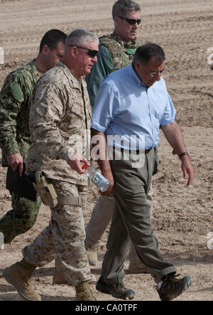 US Secretary of Defense Leon Panetta, right, talks to US Marine Corps Maj. Gen. Charles M. Gurganus, front, the commanding general of Regional Command Southwest at Forward Operating Base Shukvani during his visit March 14, 2012 in Afghanistan. Stock Photo