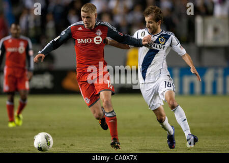 March 14, 2012 - Carson, California, U.S - Toronto FC forward Nick Soolsma #18 and Los Angeles Galaxy forward Mike Magee #18 fight for the ball during the CONCACAF Champions League game between Toronto FC and the Los Angeles Galaxy at the Home Depot Center. The Galaxy went on to be defeated and knoc Stock Photo