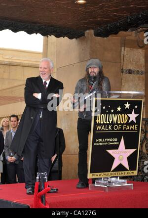 Malcolm McDowell, Rob Zombie at the induction ceremony for Star on the Hollywood Walk of Fame for Malcolm McDowell, Hollywood Boulevard, Los Angeles, CA March 16, 2012. Photo By: Elizabeth Goodenough/Everett Collection Stock Photo