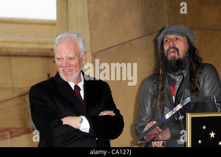 Malcolm McDowell, Rob Zombie at the induction ceremony for Star on the Hollywood Walk of Fame for Malcolm McDowell, Hollywood Boulevard, Los Angeles, CA March 16, 2012. Photo By: Elizabeth Goodenough/Everett Collection Stock Photo