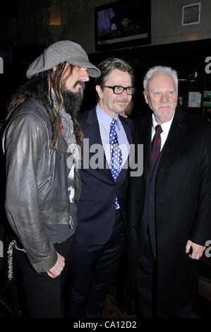 Rob Zombie, Malcolm McDowell, Gary Oldman at the induction ceremony for Star on the Hollywood Walk of Fame for Malcolm McDowell, Hollywood Boulevard, Los Angeles, CA March 16, 2012. Photo By: Michael Germana/Everett Collection Stock Photo